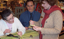 Lottie Gauthier (left) giving instructions to Brenda Enns, while Michael Wilmot watches.  DIANA MAVUNDUSE