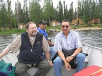 Bishop MacDonald (l) at Kingfisher Lake First Nation with Grand Chief Stan Beardy of Nishnawbe-Aski Nation (r) and Isaac Sainnawap. CHIEF MATT WINTER, KINGFISHER LAKE FIRST NATION