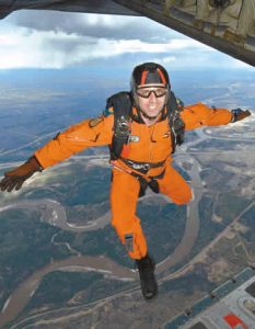 Sgt Darcy St-Laurent, a search and rescue technician (SAR tech) with 435 Squadron, 17 Wing Winnipeg, makes his 500th career jump from a CC-130 Hercules. Photo Credit: CPL COLIN AITKEN