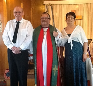Terry and Ida Reid with Bishop Larry Robertson