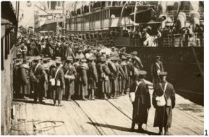 Troops of the Royal Montreal Regiment embarking at Quebec City, 1914.