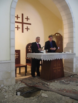 Bishop Dawani and Archbishop Hiltz celebrate the Eucharist at St. Philip's Church, Gaza City. ANDREA MANN