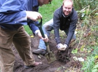 Parishioners at St. Thomas's Anglican Church, Toronto, dig in to yard work for "Benedictine Day." BERT MCINTOSH