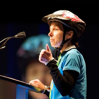 Suzanne Rumsey, Public Engagements Coordinator of PWRDF, gears up members of General Synod 2010 for Le Tour de PWRDF. BRIAN BUKOWSKI/GENERAL SYNOD COMMUNICATIONS