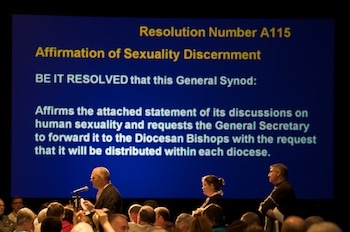 Members of General Synod line up to debate resolution A115 BRIAN BUKOWSKI / GENERAL SYNOD COMMUNICATIONS