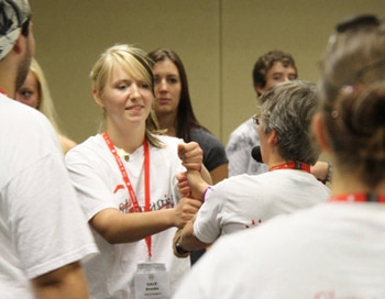Youth at the Canadian Lutheran Anglican Youth Gathering demonstrate a "B.C. lumberjack welcome handshake." EVANGELICAL LUTHERAN CHURCH IN CANADA COMMUNICATIONS