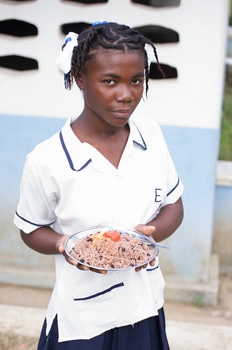 Rice, beans, and vegetables help Haitian schoolchildren stay attentive in class. SIMON CHAMBERS, PWRDF