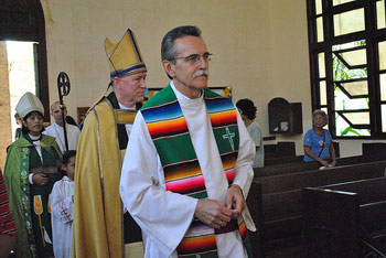 Diocese of Uruguay Bishop-elect Michael Pollesel (right) at an Episcopal diocese of Cuba service in 2011. Behind him are Anglican Church of Canada primate, Archbishop Fred Hiltz, and Diocese of Cuba bishop Griselda Delgado del Carpio. ANDREA MANN/GENERAL SYNOD COMMUNICATIONS