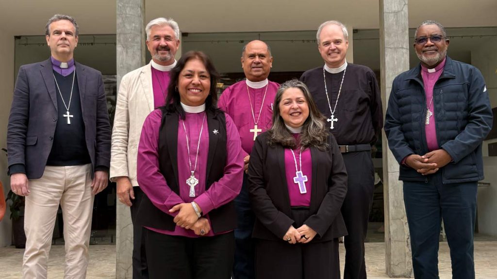 Anglican primates of the Americas meet in São Paulo, Brazil. Front row, l-r: Archbishop Alba Sally Sue Hernández García and Archbishop Marinez Rosa dos Santos Bassotto. Back row, l-r: Archbishop Brian Williams, Archbishop Shane Parker, Archbishop Juan David Alvarado Melgar, Presiding Bishop Sean Rowe, Archbishop Philip Wright