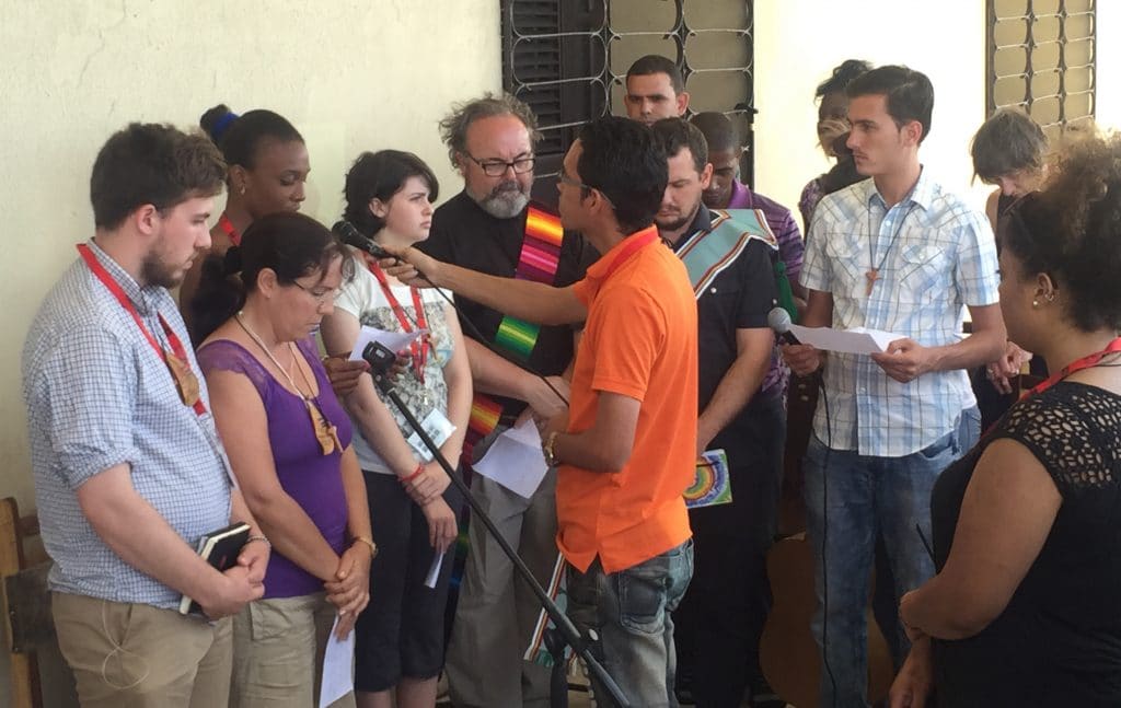 Justice Camp participants read the liturgy in English and Spanish during the closing Eucharist.