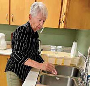 Marion Berube at the sink!