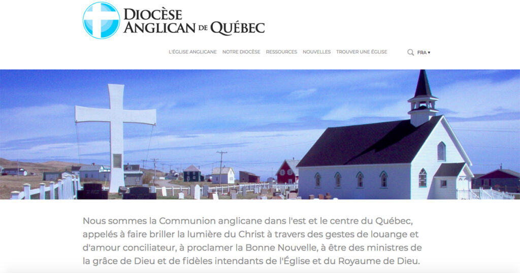 Image of a church building under a clear blue sky, with a white exterior and a sloped roof, located in a rural area of Quebec. The image is featured on the website of the Anglican Diocese in Quebec, emphasizing the community's commitment to faith and service.