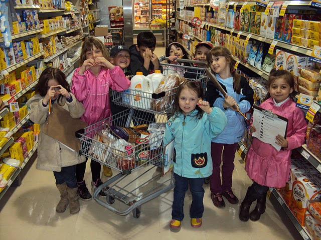 Elementary school students go grocery shopping as part of the Daily Bread Project. Submitted photo