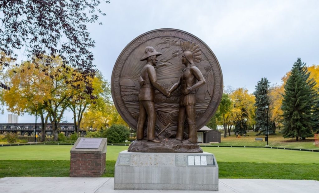 Photo: Vadim Gouida/Shutterstock. Edmonton,Canada, October 6, 2024: Treaty No.6. Adhesions 1877-1950 at the Alberta Legislature ground. An enlargement of the original medallion gifted by the Crown to signatories.