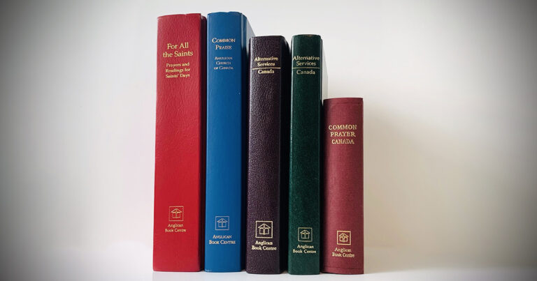 Five hardcover books arranged vertically, showcasing different colors including red, blue, green, and purple, with gold lettering on the spines.