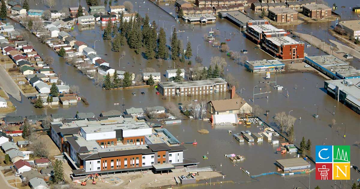 An aerial photo of Fort McMurray taken April 28 shows the city centre overwhelmed by floodwaters.