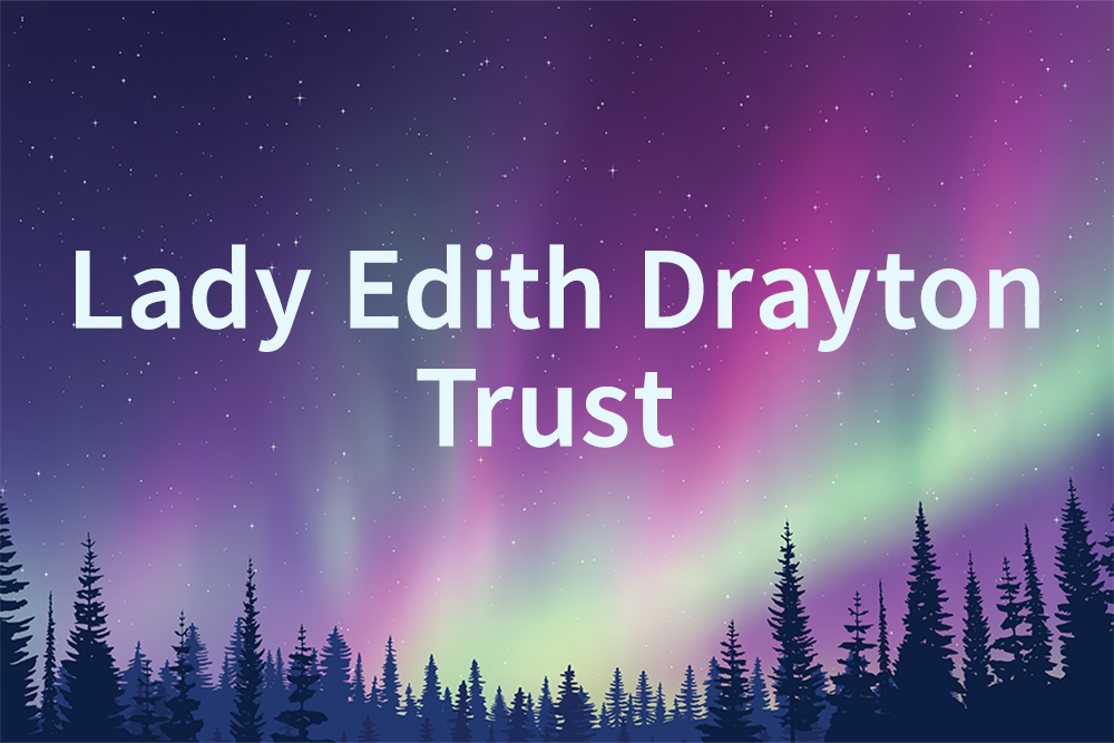 Backdrop of northern lights and treeline, mix of purple, blue and green cool colours, with the words "Lady Edith Drayton Trust" in white lettering superimposed on the image.