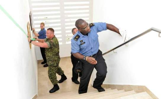 Padre Nigel Tulley (pictured in the foreground) is a chaplain with Maritime Forces Pacific.