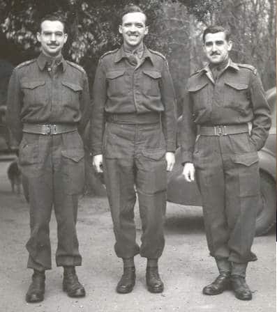 Left to right: Captain(H)”Rusty” Wilkes, center, with two other RCR officers, Capt “Cec” Hollingsworth (L) and Lt. “Klink” Klenavic, in England early in World War Two.
