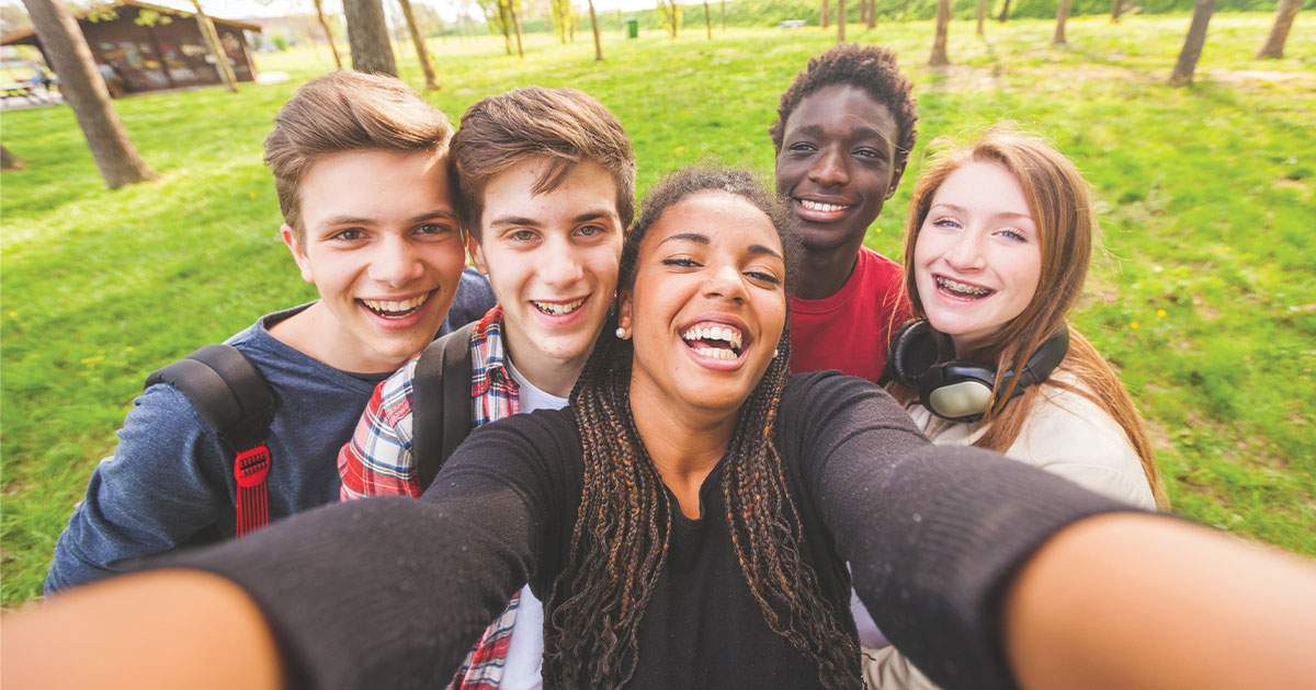 Group of youth smiling for a selfie